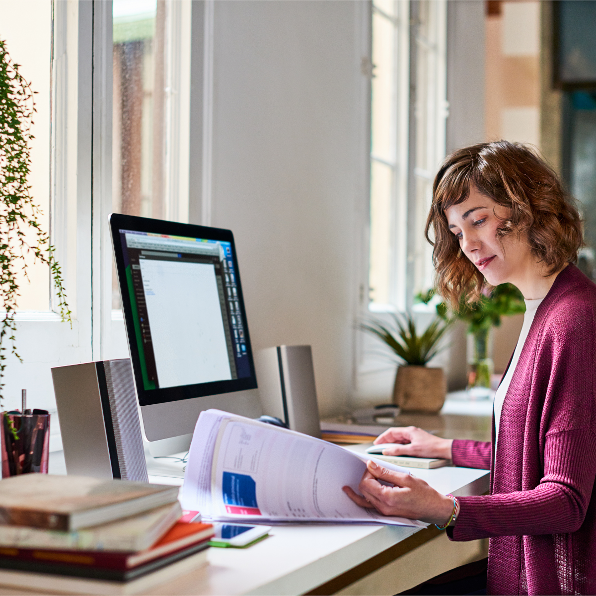 Business owner comparing outsourced HR solutions 